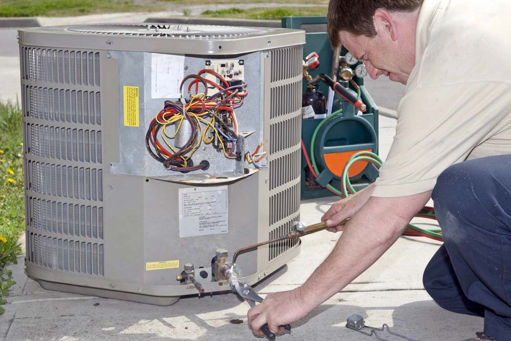 Blog-AC-repair HVAC condenser unit outside a Florida single-family rental home